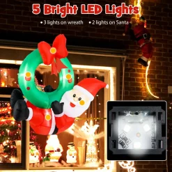 Tangkula 4 FT Inflatable Hanging Santa Claus Wreath, Christmas Pre-Lit Santa & Wreath with Red Bow & 5 LED Lights